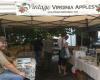 Selling apples and cider at the Charlottesville City Market